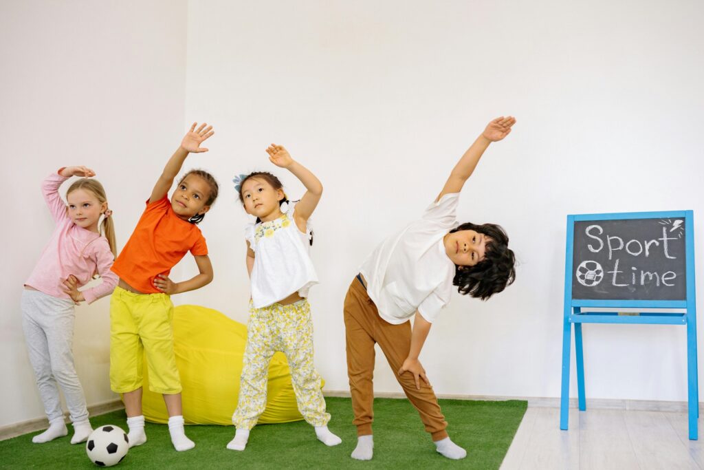 Young children are warming up for a physical activity